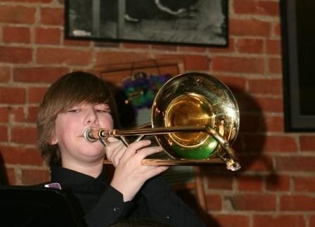 student playing the trombone